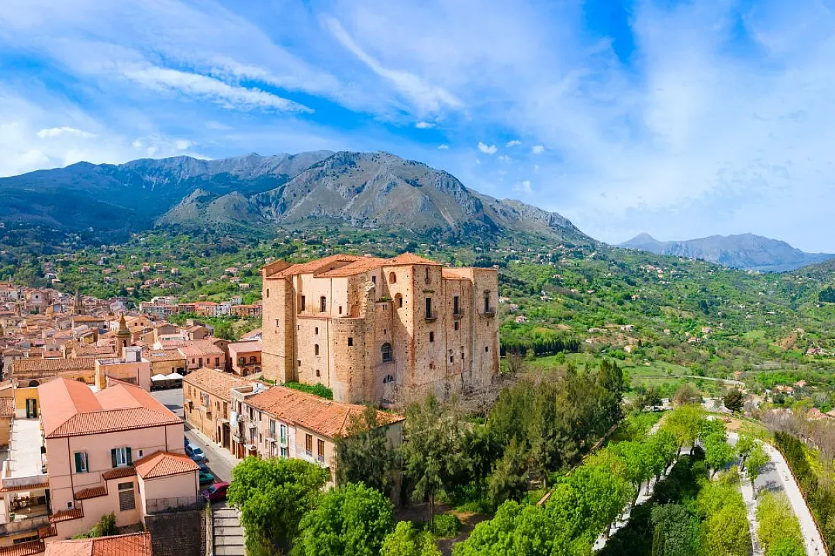 Picturesque cobblestone streets and rustic stone architecture in the historic center of Castelbuono, Sicily.