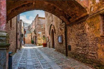 Picturesque cobblestone streets and ancient stone architecture in the historic center of Erice.