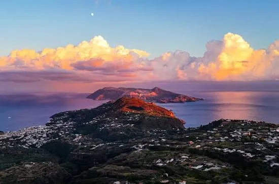 Scenic waterfront landscape overlooking the calm bay and traditional harbor of Lipari Island.