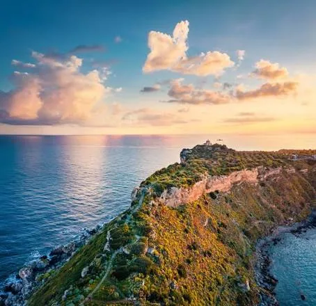 Picturesque view of the tranquil blue sea and waterfront coastline in Milazzo.