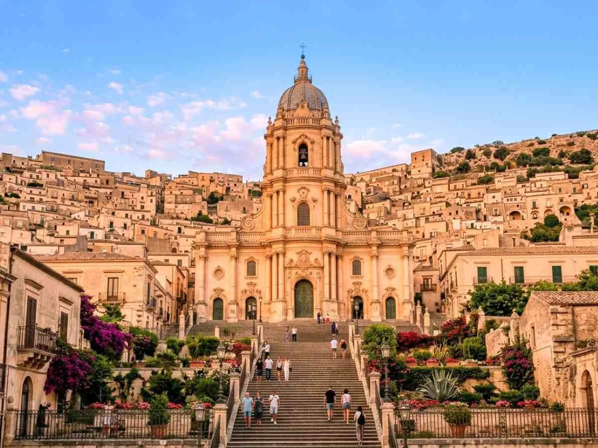 Dramatic sunset landscape over the baroque town of Modica in the Val di Noto, Sicily.