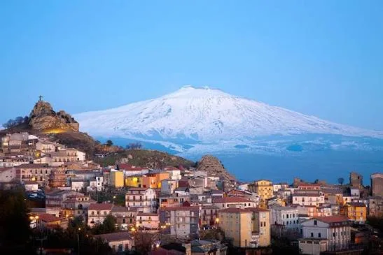 Dramatic view of ancient volcanic craters and rugged natural terrain on Mount Etna, Sicily.