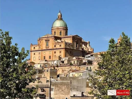 Picturesque view of the lush Sicilian countryside surrounding the historic town of Piazza Armerina.