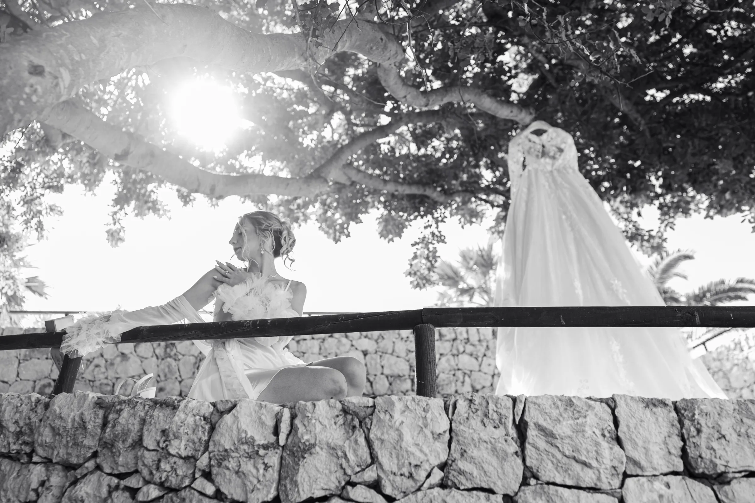 Bride playfully posing in her bridal robe