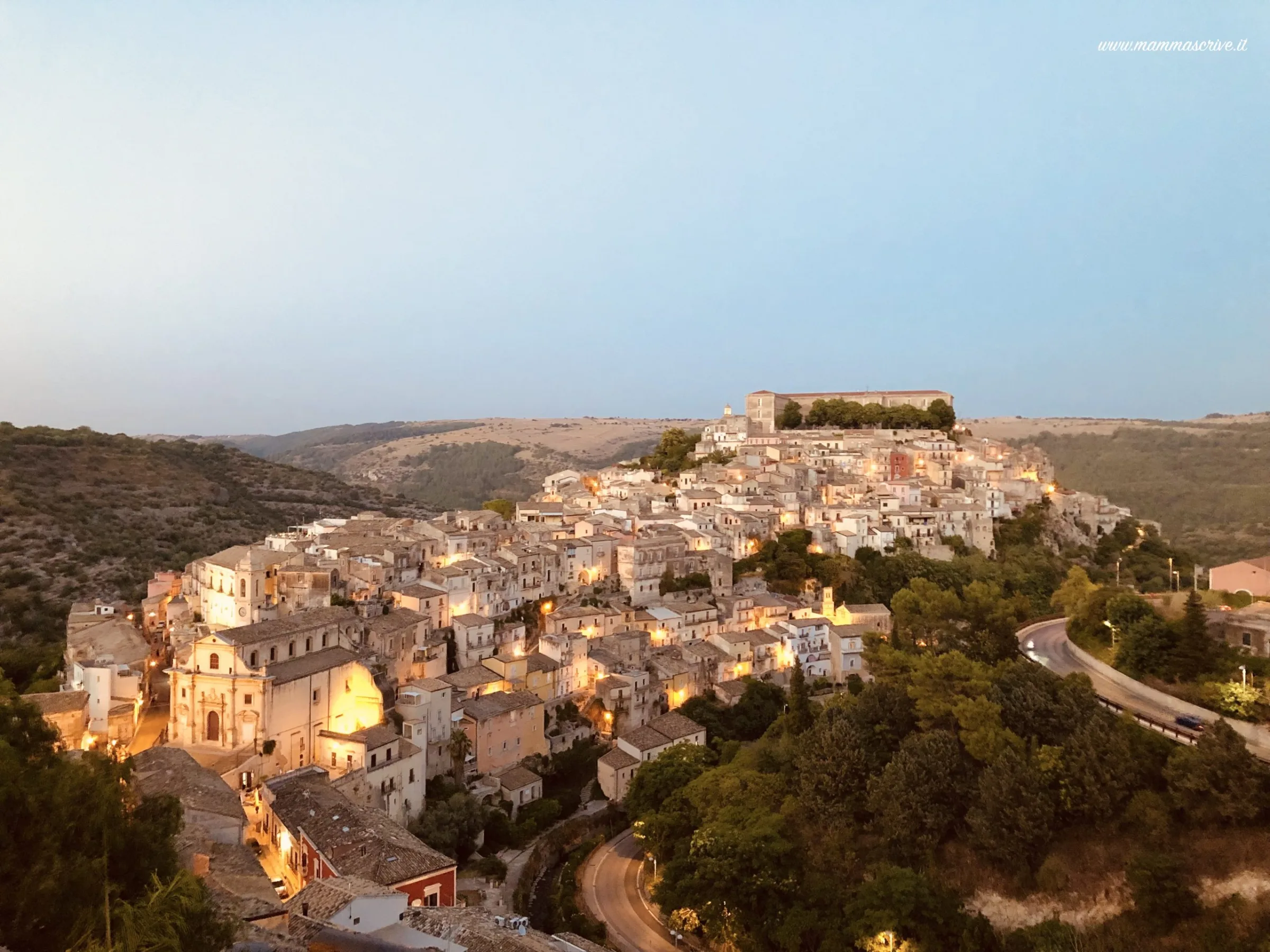 Candid moment of a bride and groom strolling along the charming stone alleys and staircases of Ragusa Ibla.