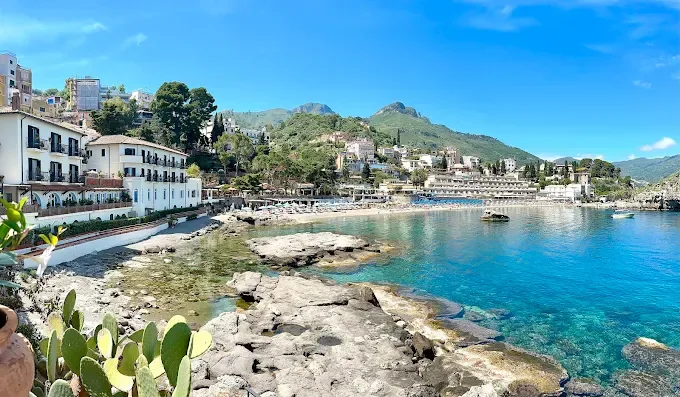 Intimate beachfront destination wedding at Villa Sant'Andrea in Taormina bay